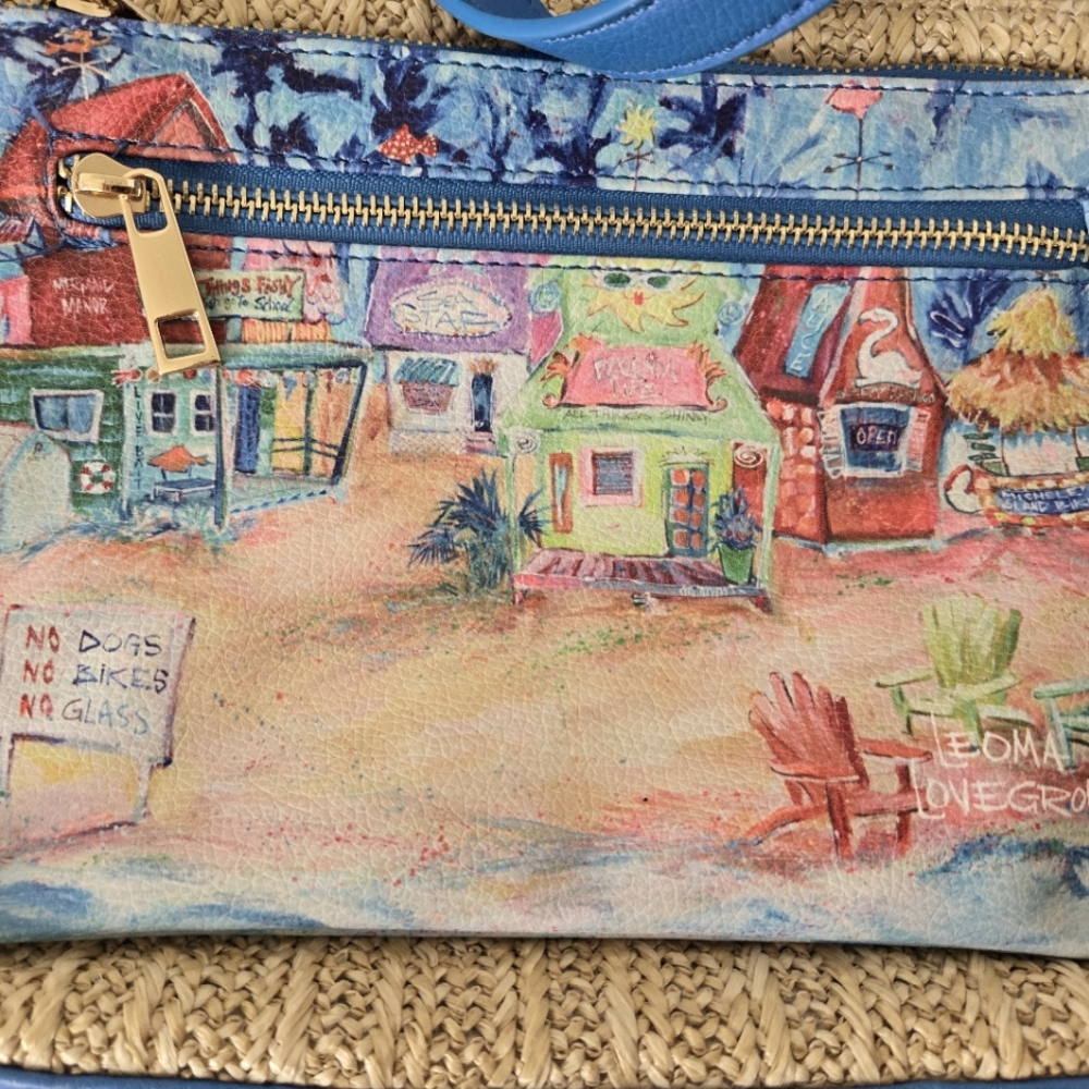 Leoma Lovegrove Vacation Ready Shoulder or Crossbody Purse. Straw /faux leather